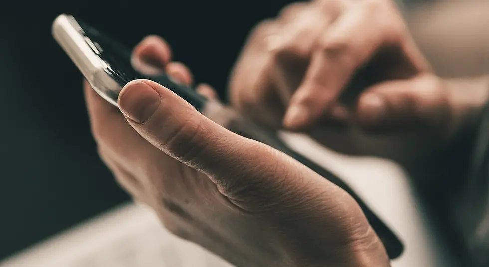 A phone in a pair of hands